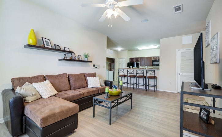 high view off campus apartments near utsa san antonio fully furnished 1 2 and 4 bedroom apartments common area living room and kitchen upgraded wood style flooring